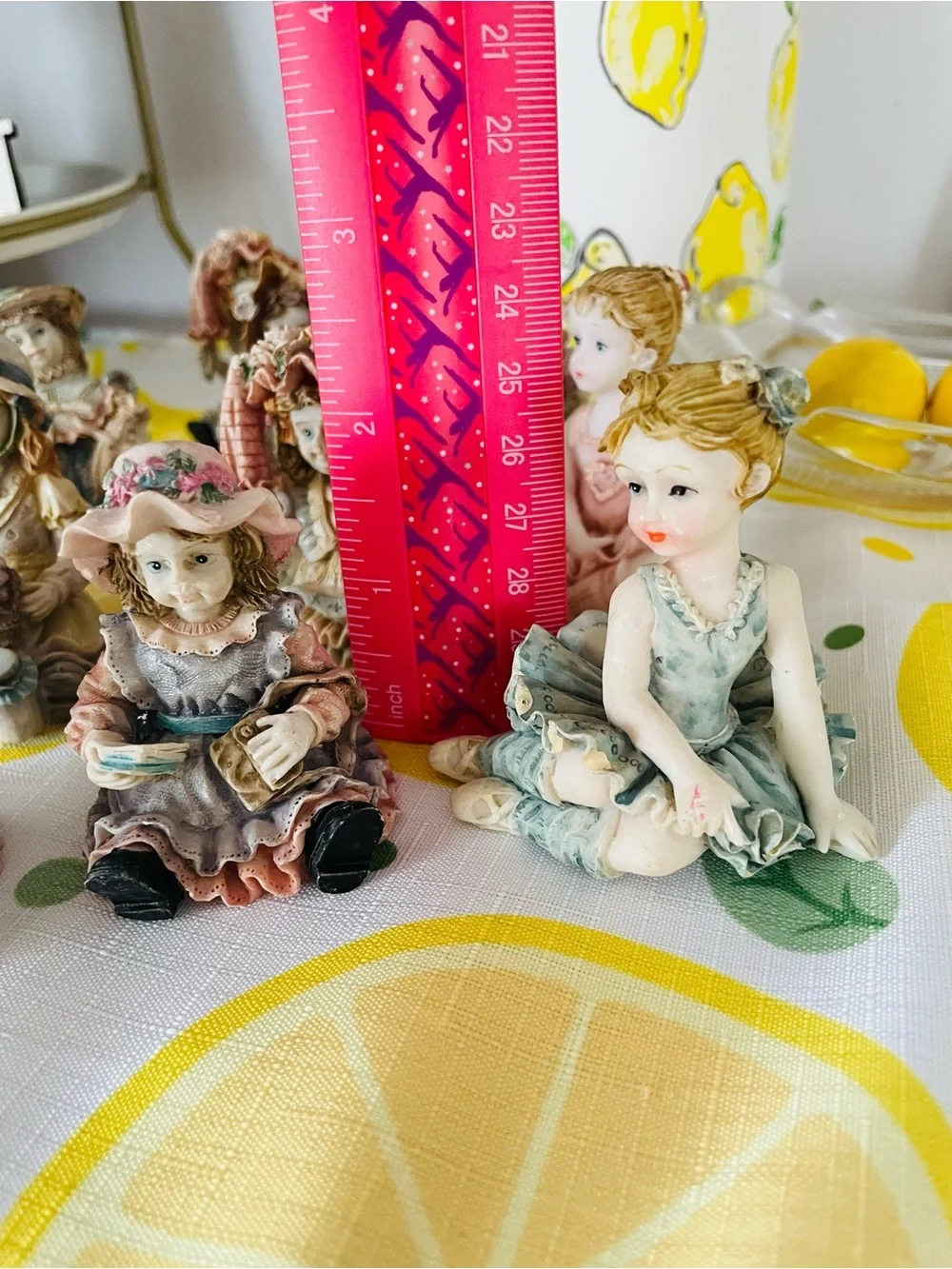 Collection of 14 Porcelain Figurines in Pastel Colors